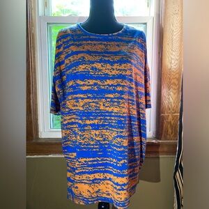 Lularoe cozy top shirt The color is orange and blue small shirt